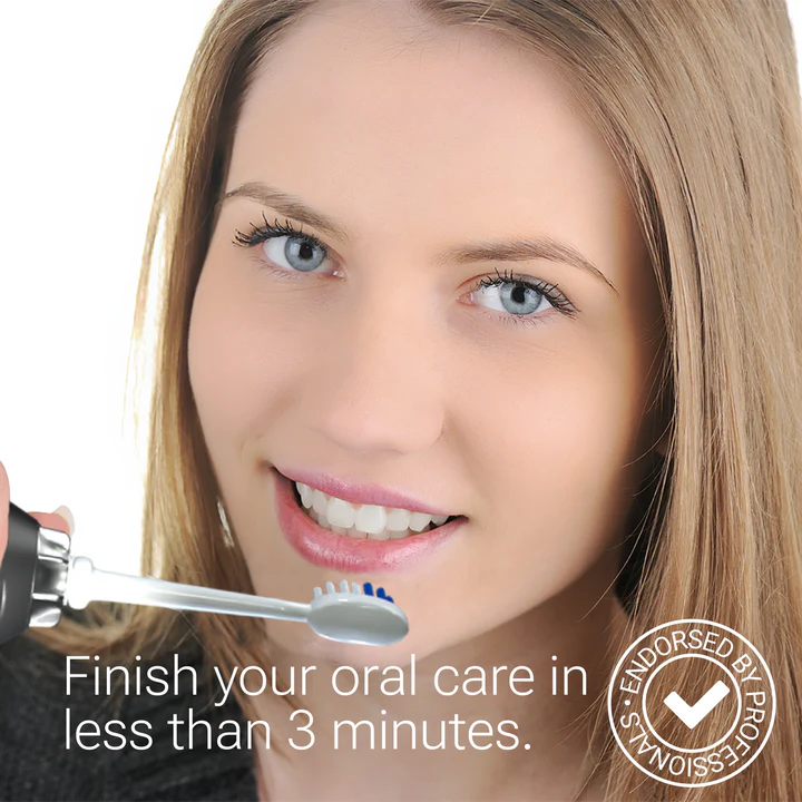Woman using the HydraSmile water flosser with the toothbrush tip